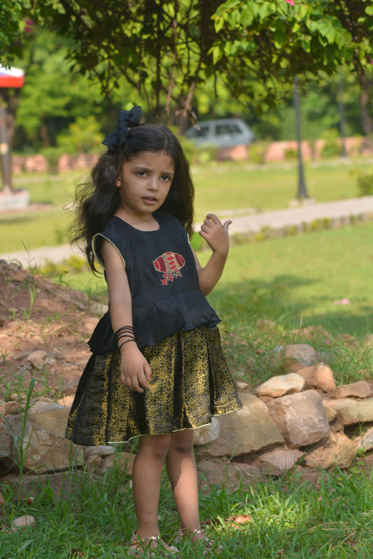 Sleeveless Frock with embroidered motif and golden printed Skirt