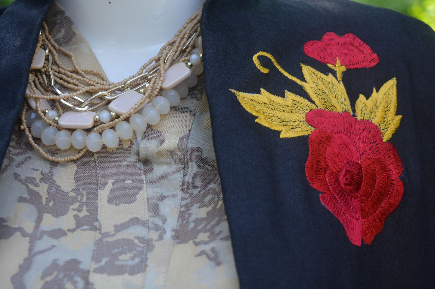 Black blazer with embroidered motif